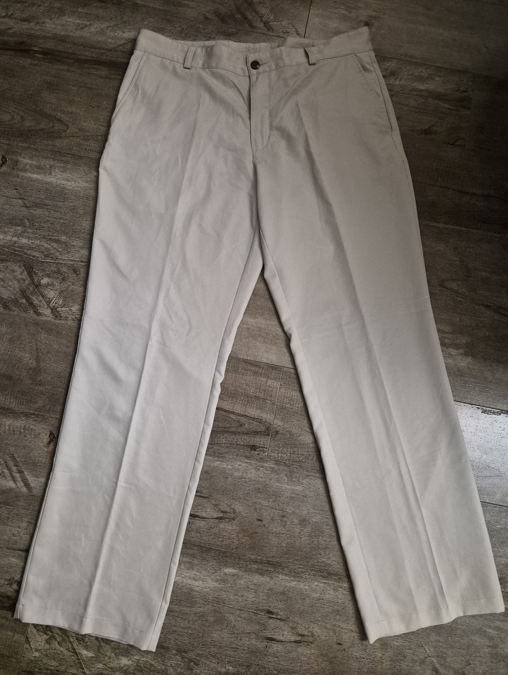 Men's Adida's (Golf) ClimaLite Classic Straight-Leg Chinos in Light beige.